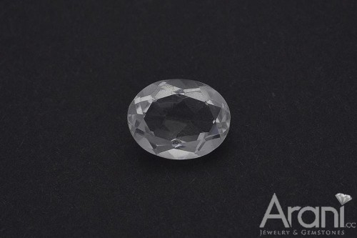 kam F topaz biał. owal  7x9
